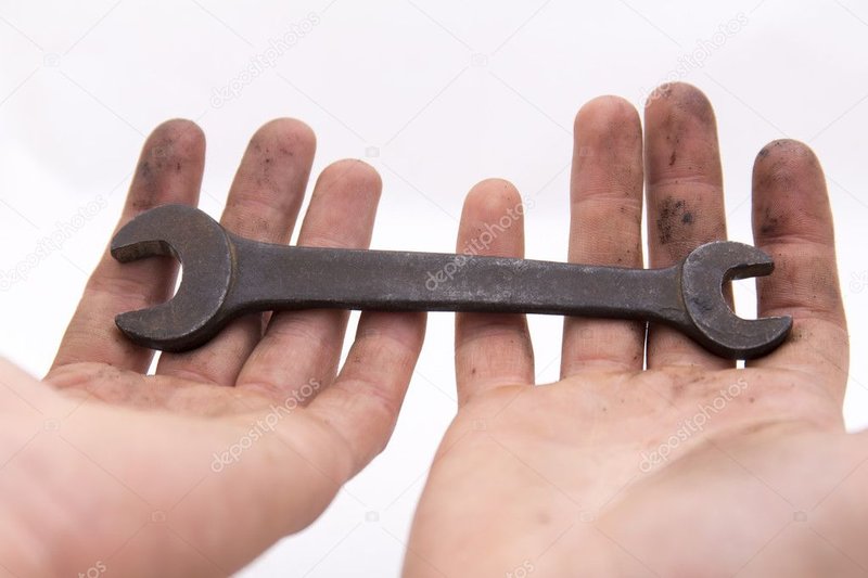 depositphotos_86388130-stock-photo-wrench-in-the-human-hand.jpg