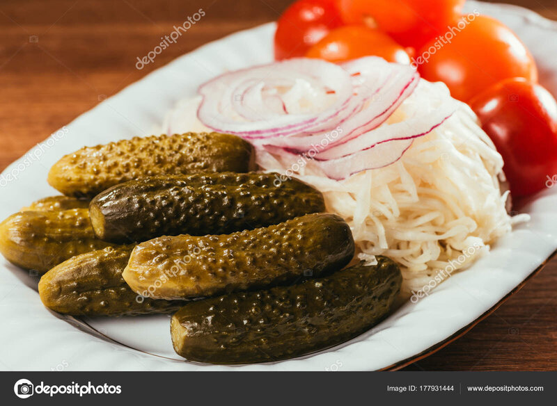 depositphotos_177931444-stock-photo-close-view-sauerkraut-served-pickled.jpg